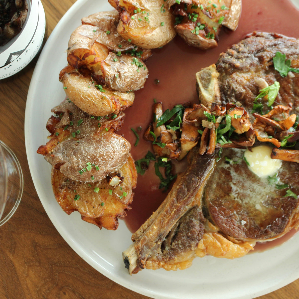 Carman Ranch Ribeye with Crispy Salt Potatoes, Wild Mushrooms and Beurre Rouge