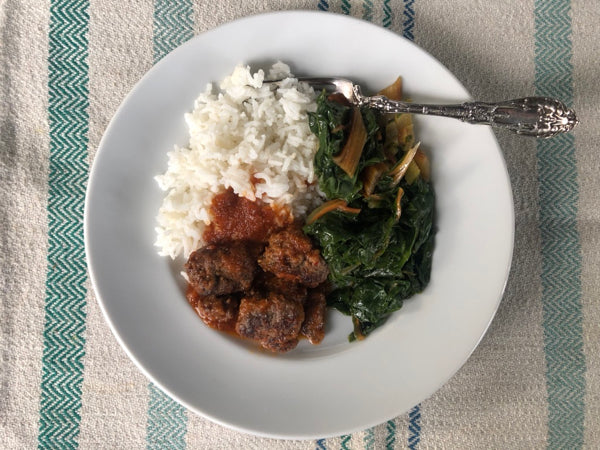 Meatballs with Tomato, Ginger & Garlic Sauce, Braised Greens, and Rice